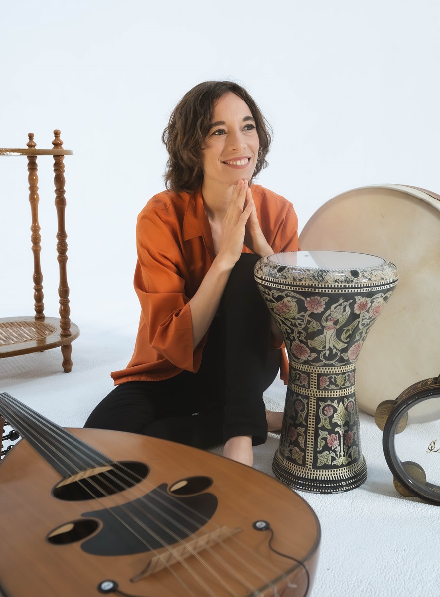 April Centrone posing with a derbouka percussion instrument